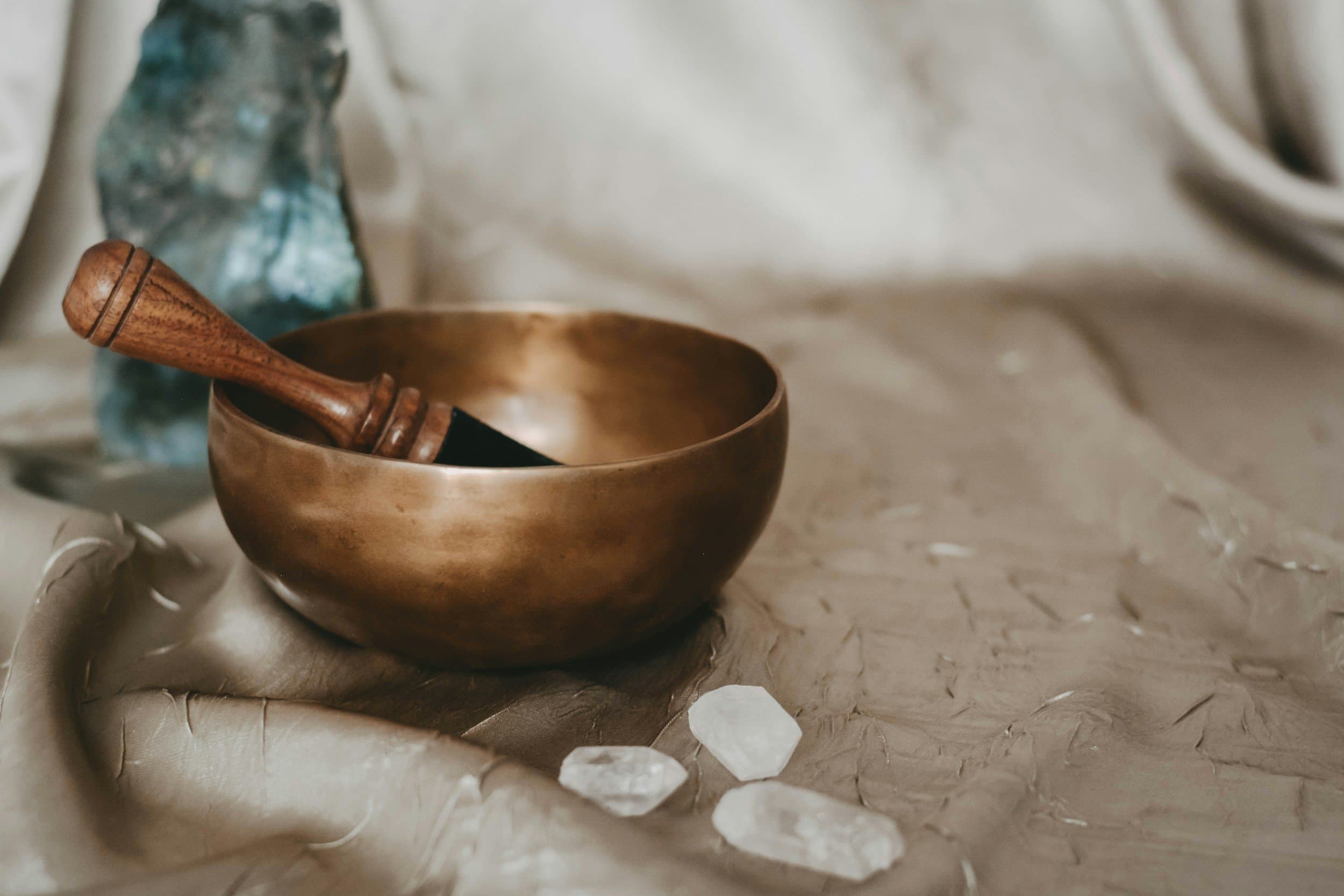 Sound therapy session with crystal singing bowls